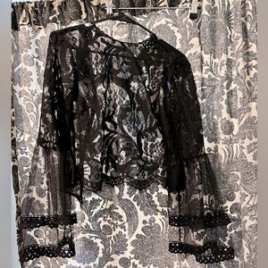 Black lace bell sleeve top.